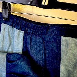 Two piece size 12 Jean women’s pants suit. Elastic waist, wide leg pants